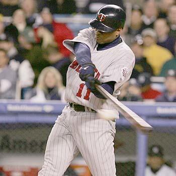 Minnesota Twins' Jacque Jones connects for a solo home run against the New York Yankees during the sixth inning