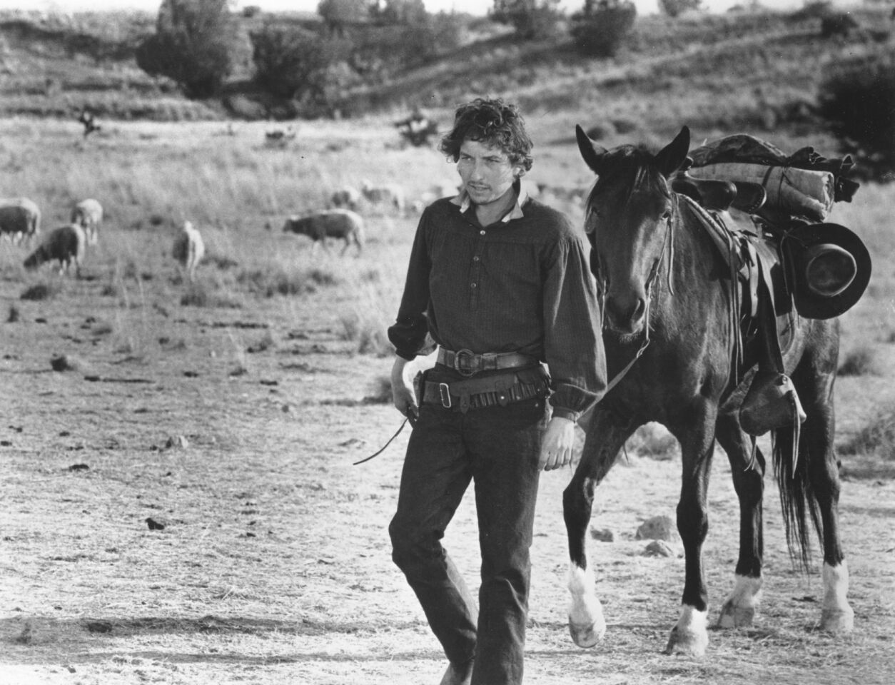 Bob Dylan appears in a film still for "Pat Garrett & Billy the Kid" (for which he also did the soundtrack) which was released in May 1973 and filmed in Durango, Mexico.