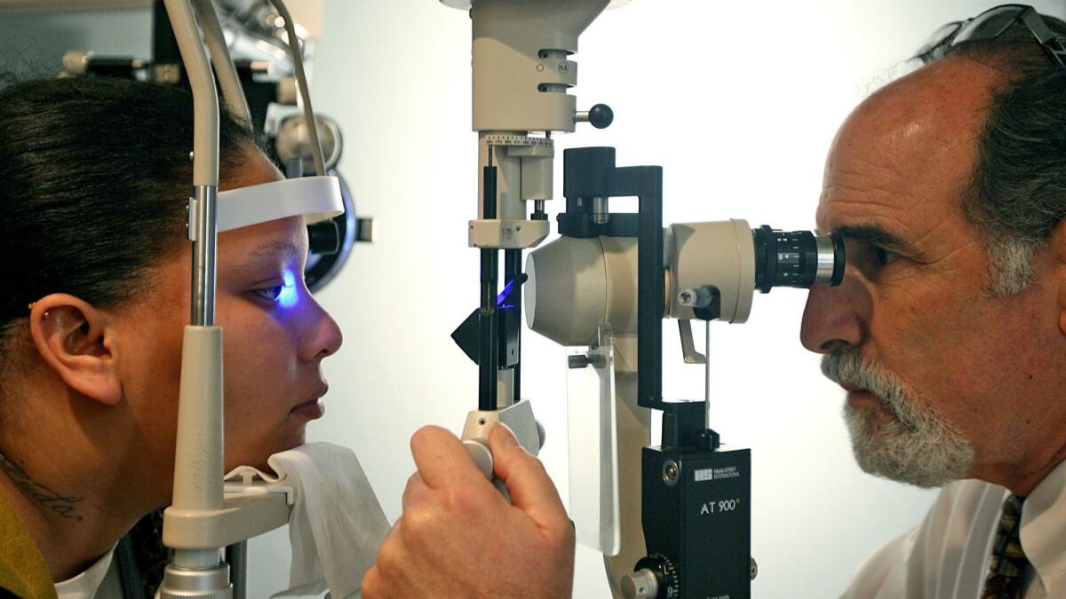 A Medi-Cal patient receives an eye exam in Compton, Calif. on Jan. 13, 2010.