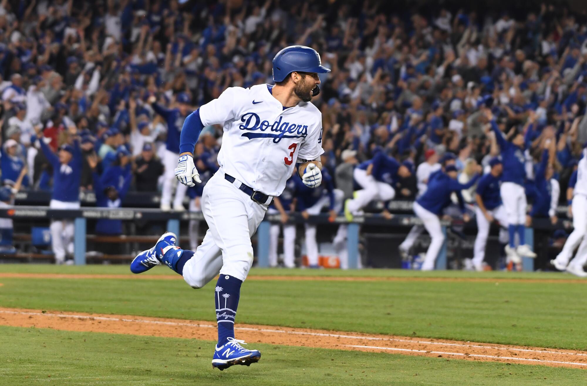 Chris Taylor rounds the bases after hitting the game-winning two-run home run.
