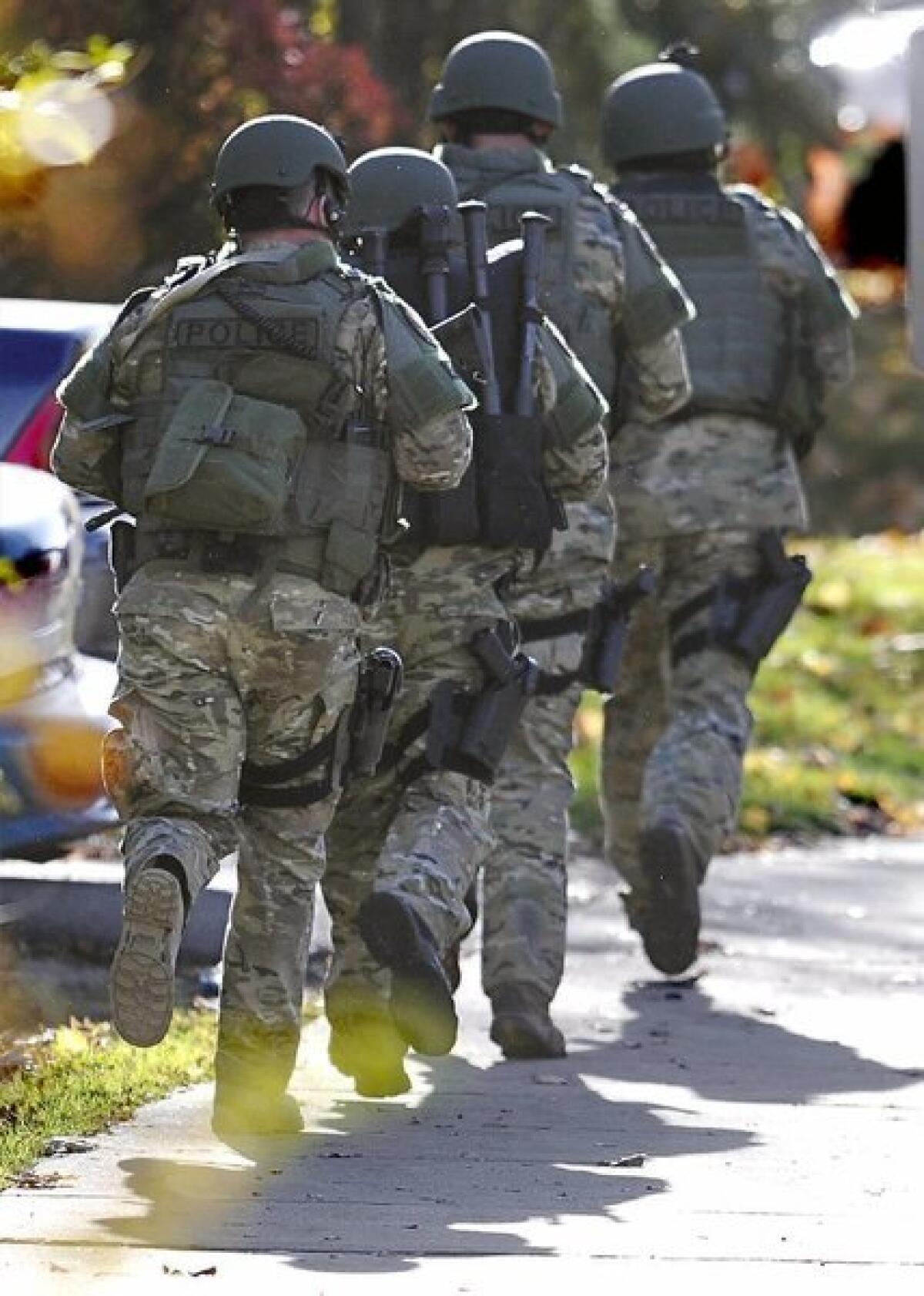 Police swarmed the campus of Central Connecticut State University in New Britain, Conn., on Monday in response to reports of an armed man. The man turned out to be unarmed and wearing a Halloween costume.