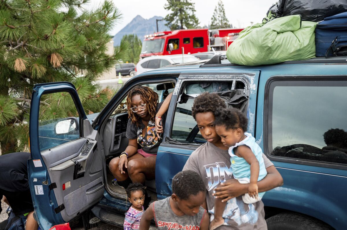 A family at a shelter for fire victims.