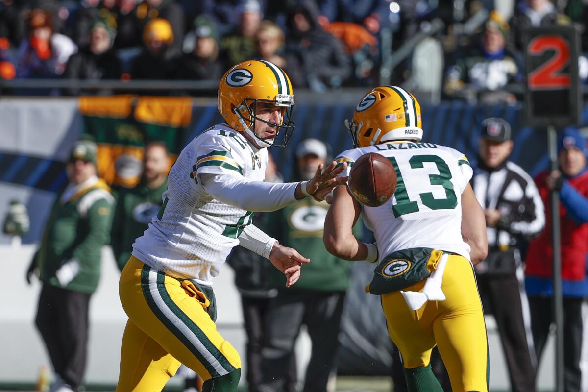 Green Bay Packers quarterback Aaron Rodgers losses the ball against the Chicago Bears on Dec. 4.