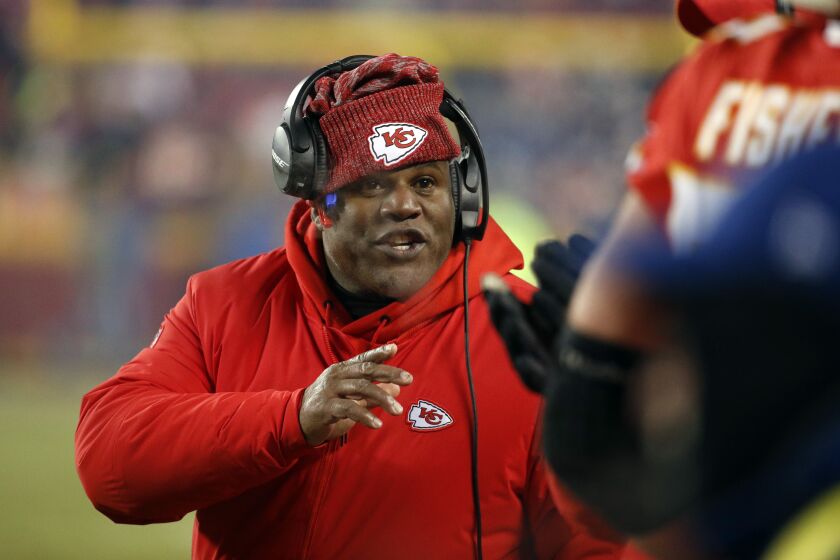 FILE - In this Jan. 20, 2019, file photo, Kansas City Chiefs offensive coordinator Eric Bieniemy gestures during the second half of the AFC Championship NFL football game, in Kansas City, Mo. The Browns are interviewing Chiefs offensive coordinator Eric Bieniemy Friday, Jan. 3, 2010, in Kansas City for their head coaching vacancy, the club announced.(AP Photo/Charlie Riedel, File)