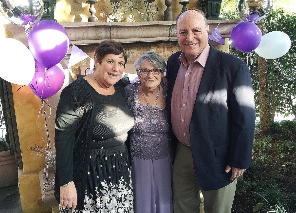 Eleanor Reicher, center, celebrates her 100th birthday with daughter Cella Baker and son, Bob Reicher.