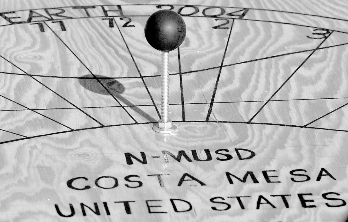 Photographed in 2004, a sundial sits on the roof at the Newport-Mesa Unified School District complex in Costa Mesa. The district is celebrating its 50th anniversary this year.