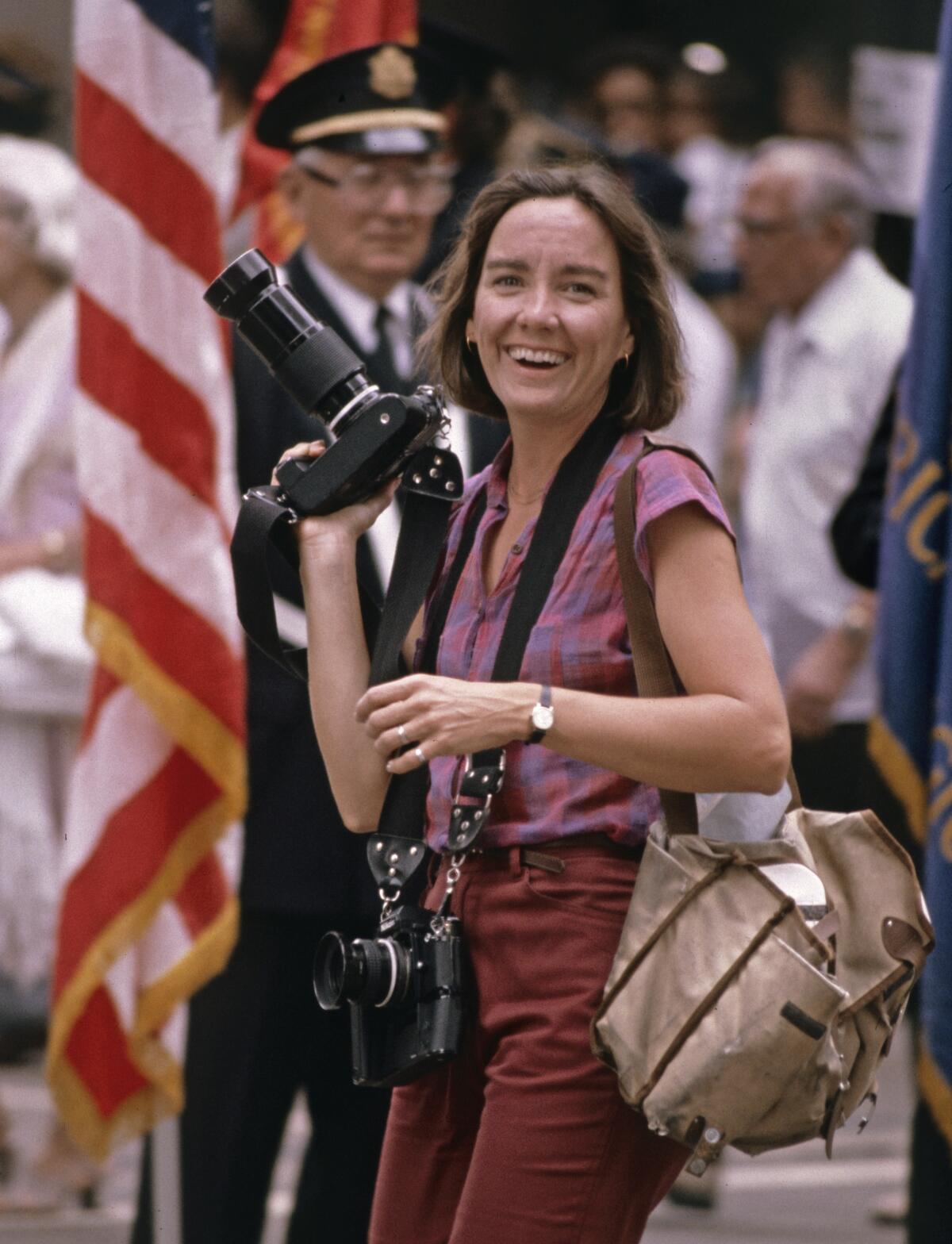 An undated photo of Anne Cusack on assignment.