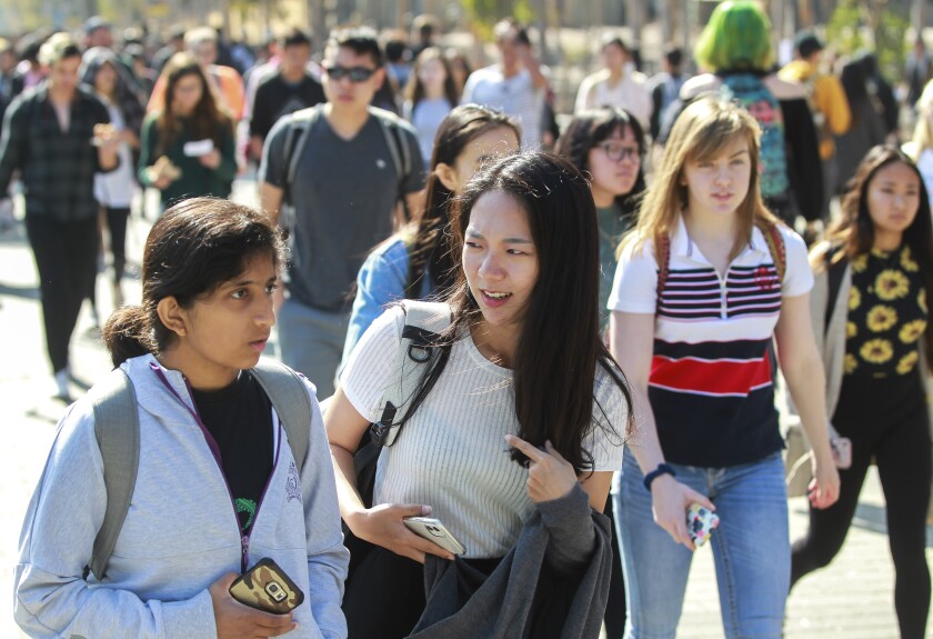 Students walk at the UC San Diego campus in La Jolla in November 2019.