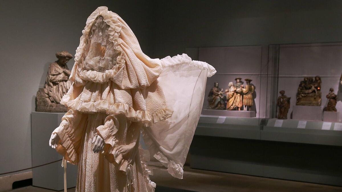 An installation view of "Heavenly Bodies: Fashion & the Catholic Imagination" at the Metropolitan Museum.