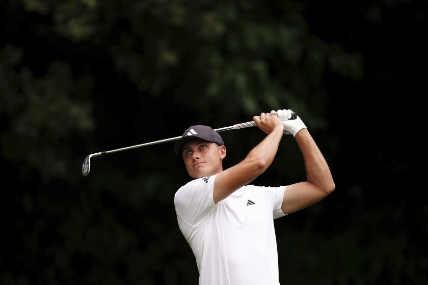 FILE - Sweden's Ludvig Aberg in action during day four of the 2023 PGA Championship at Wentworth Golf Club in Virginia Water, Surrey, England, Sunday, Sept. 17, 2023. Aberg is the world’s most talked-about young golfer and is about to play in his first Ryder Cup less than four months after the 23-year-old Swede turned pro. It’s not just his long and accurate drives that set him apart from other up-and-coming talents. (John Walton/PA via AP, File)
