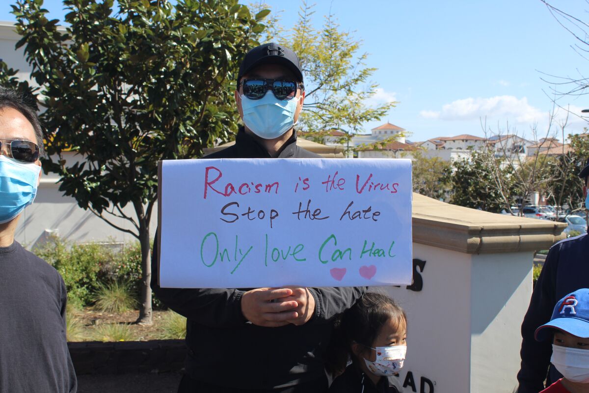 A protester at the Stop Asian Hate rally in Pacific Highlands Ranch.