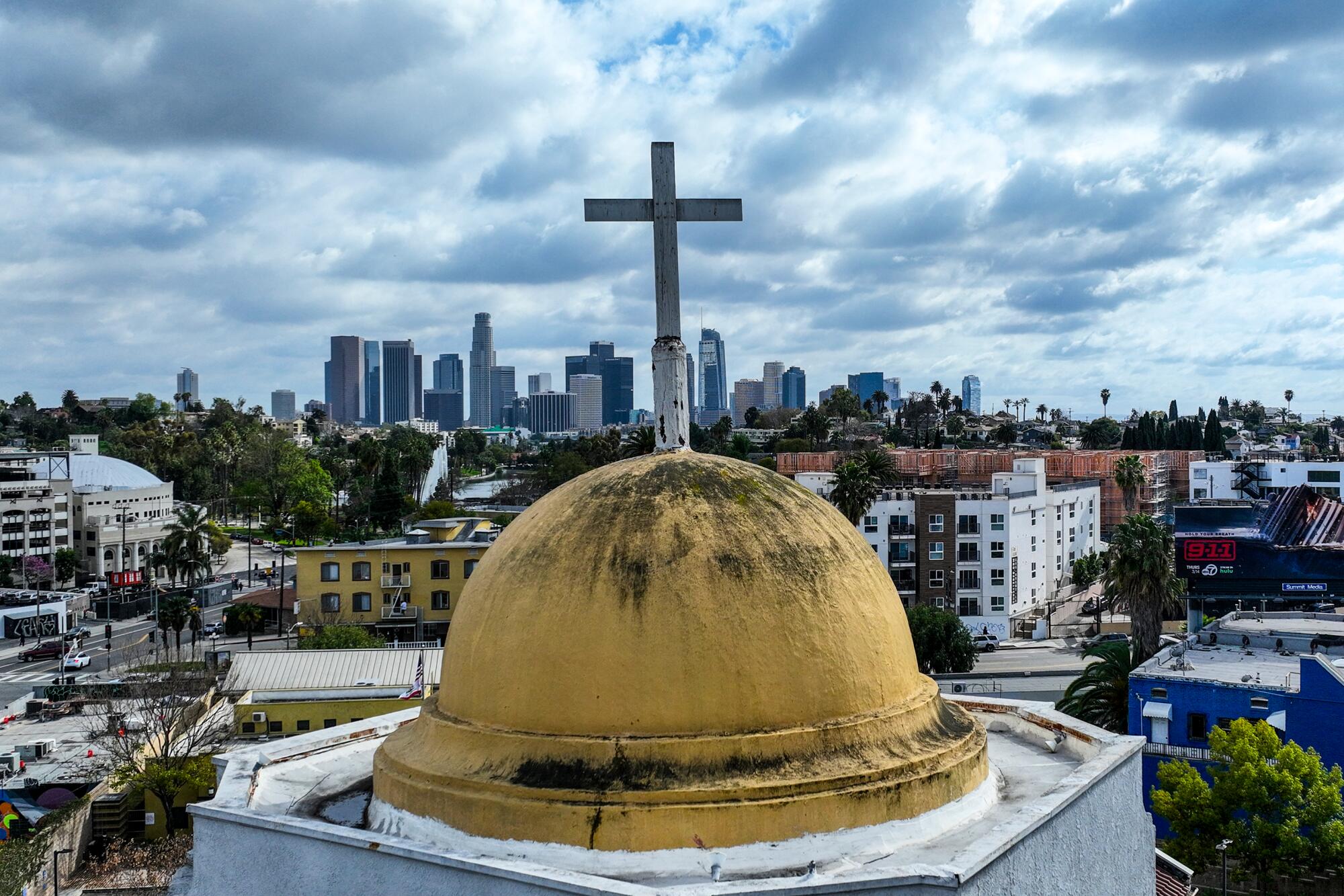 A cross and dome atop a church
