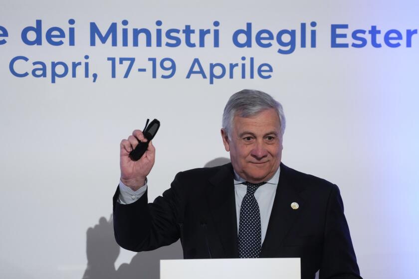 Italian Foreign Minister Antonio Tajani gestures as he speaks to reporters during the final press conference at the G7 Foreign Ministers meeting on Capri Island, Italy, Friday, April 19, 2024. (AP Photo/Gregorio Borgia)