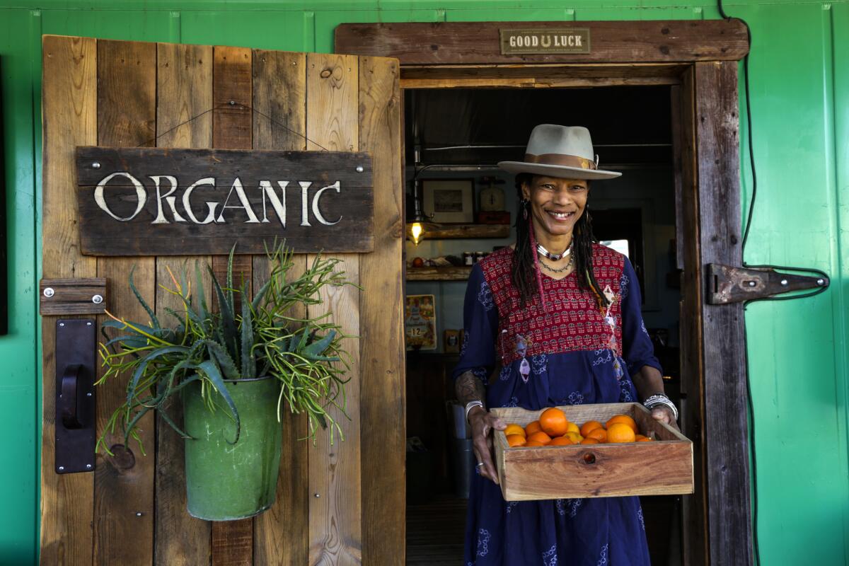 Renée Günter, who grew up in South Los Angeles, learned about food while modeling in Europe. These days she sells organic fruit and vegetables at Daily Organics, housed in a colorful former shipping container at the Shops at Adams Gateway.