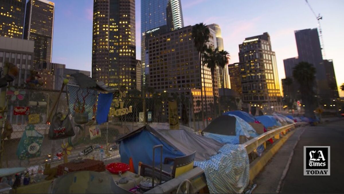 Tents fill a sidewalk in downtown Los Angeles