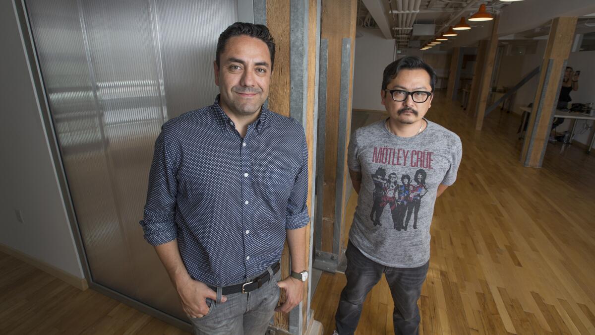 Soda Creative, based in downtown Los Angeles, is one of several companies that have sprouted up to take advantage of studios’ appetite for targeted marketing. Above, owner Jaime Gamboa, left, and business partner Jaehoon Oh.
