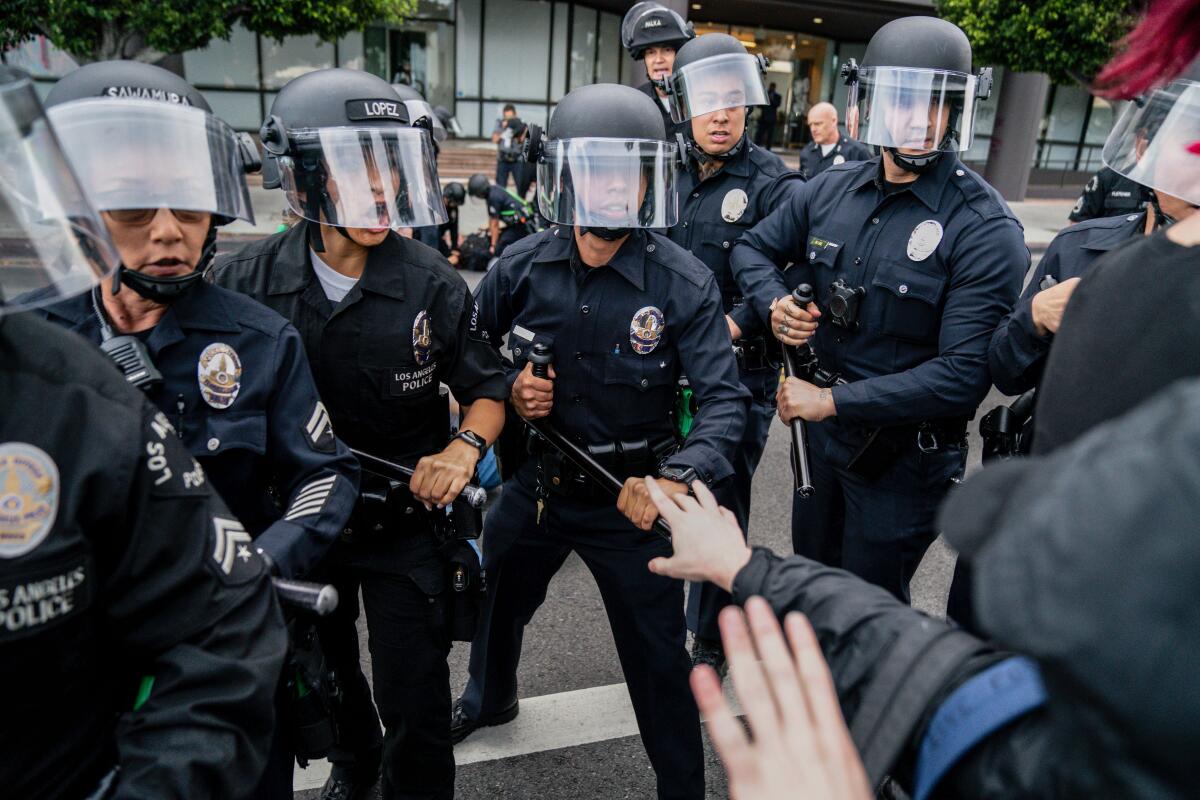Police clash with protesters in the Fairfax District of Los Angeles in May 2020. 
