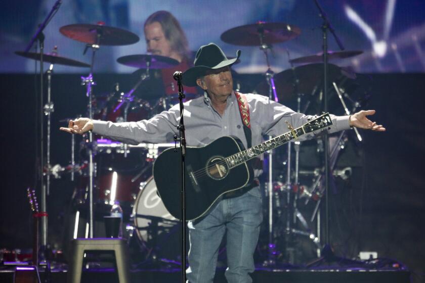 George Strait Performs at Mercedes Benz Stadium on Friday, November 5, 2021, in Atlanta. (Photo by Robb Cohen/Invision/AP)