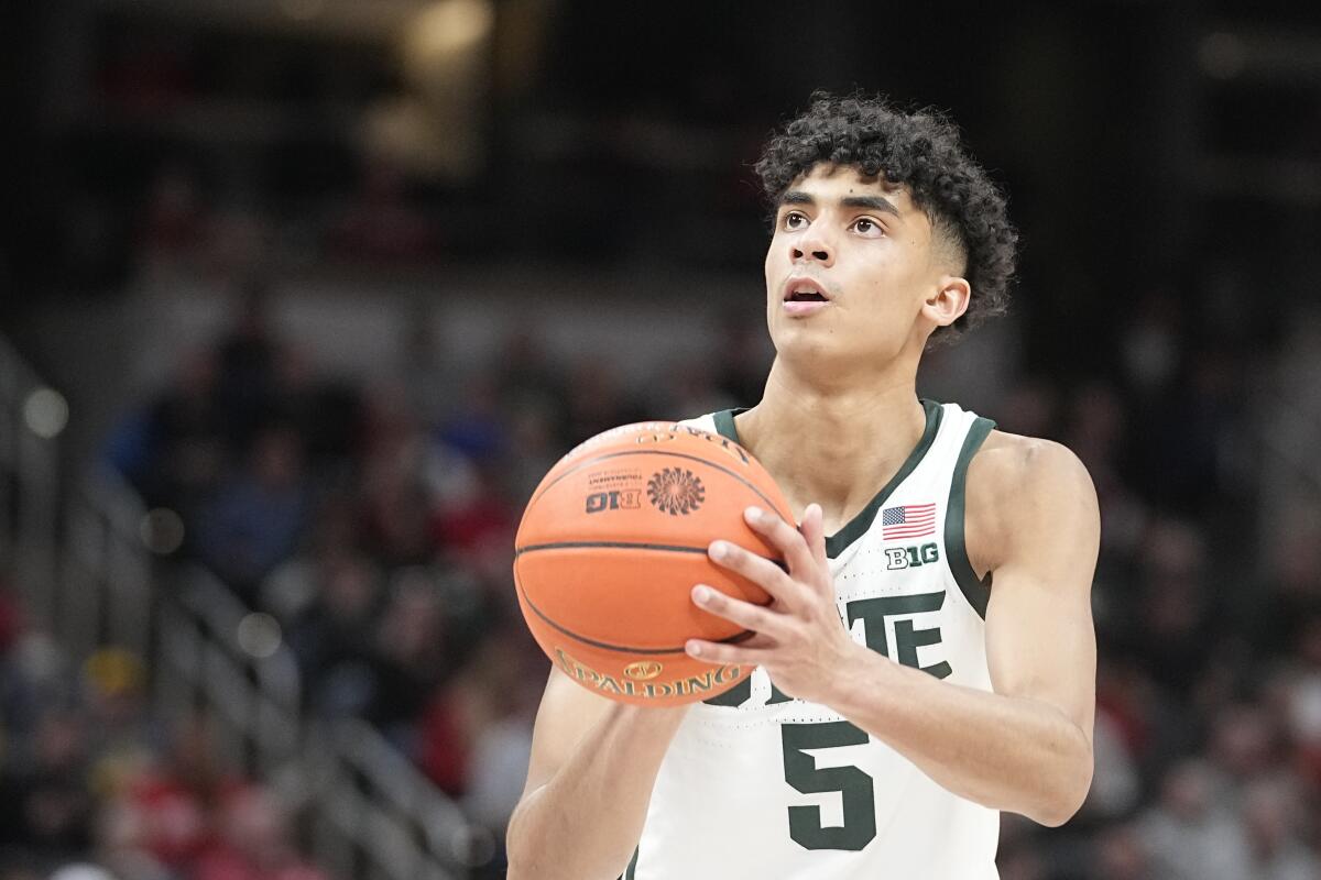 Michigan State's Max Christie shoots during the second half against Maryland.