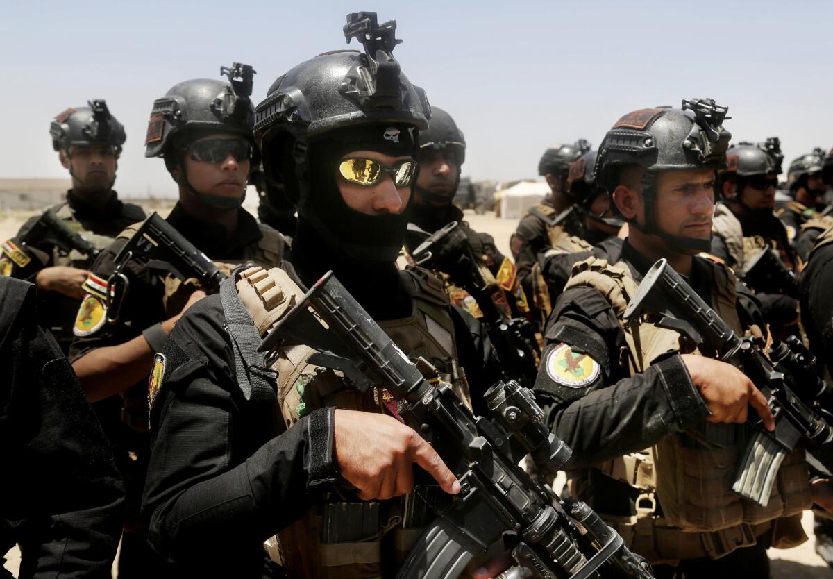Iraq's elite counter-terrorism forces gather Sunday ahead of an operation to retake the Islamic State-held city of Fallouja.