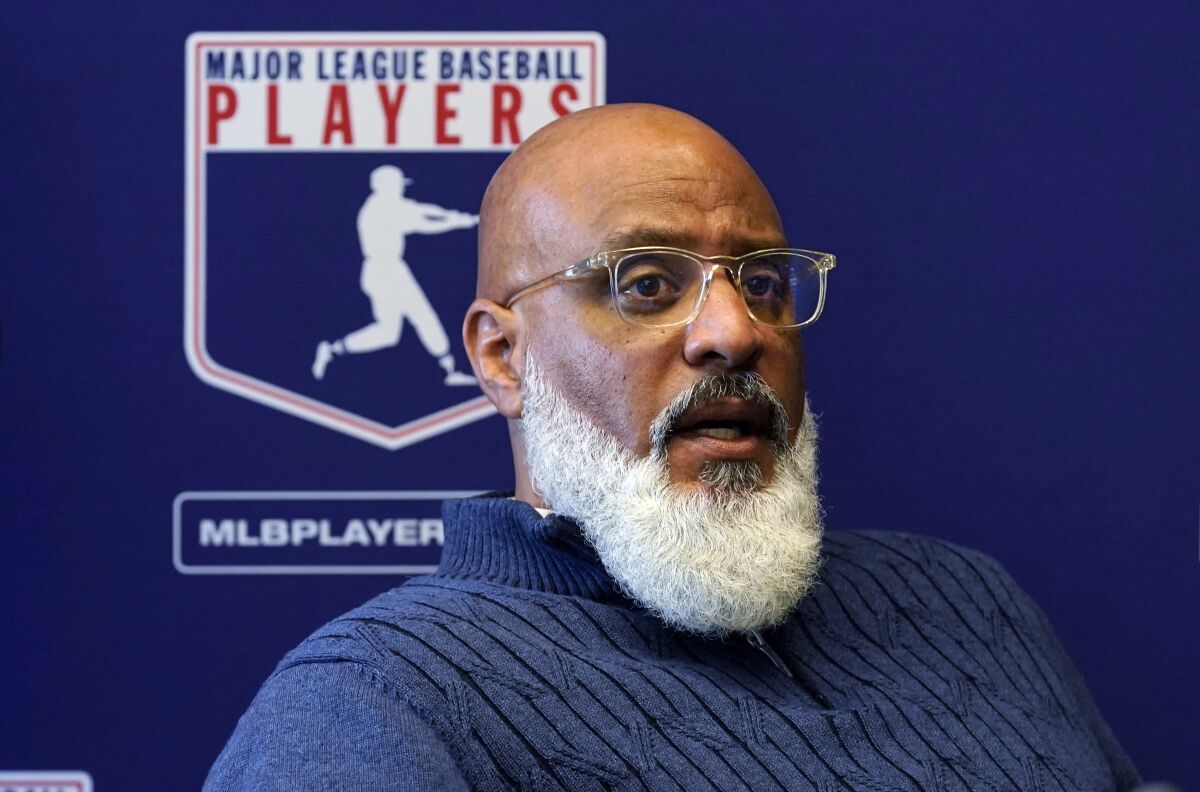 FILE - Major League Baseball Players Association Executive Director Tony Clark answers a question during a news conference in New York on March 11, 2022. The MLBPA has voted to extend Clark's contract through 2027. The 50-year-old Clark helped broker the players’ current labor deal with MLB. After several contentious months of negotiations, the MLBPA and MLB agreed to the new deal in March, which saved a full 162-game season. (AP Photo/Richard Drew, File)