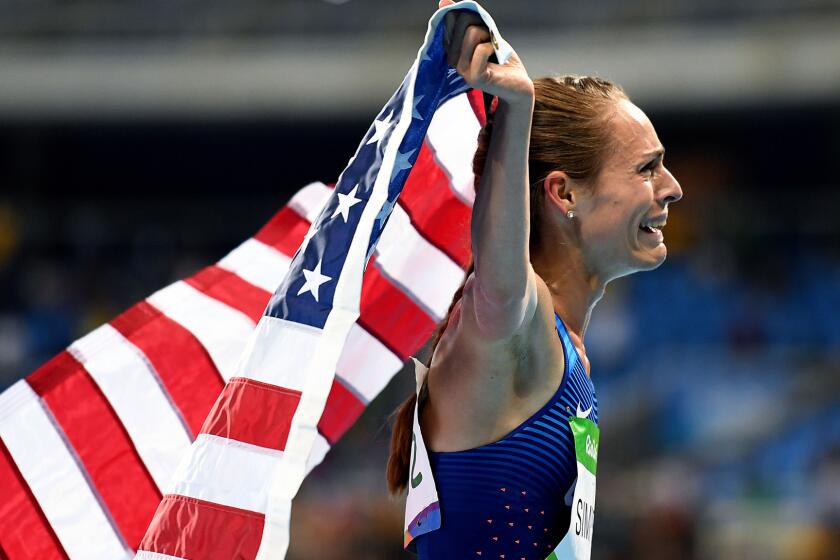 American distance runner Jenny Simpson can't hold back her emotions after winning the bronze medal in the 1,500 meters on Tuesday night.