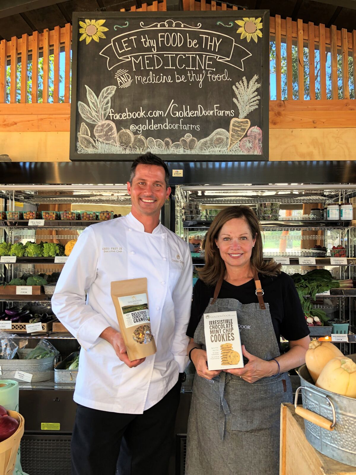Golden Door chef Greg Frey Jr. and G.M. Kathy Van Ness hold some of the spa's famous granola and cookies.