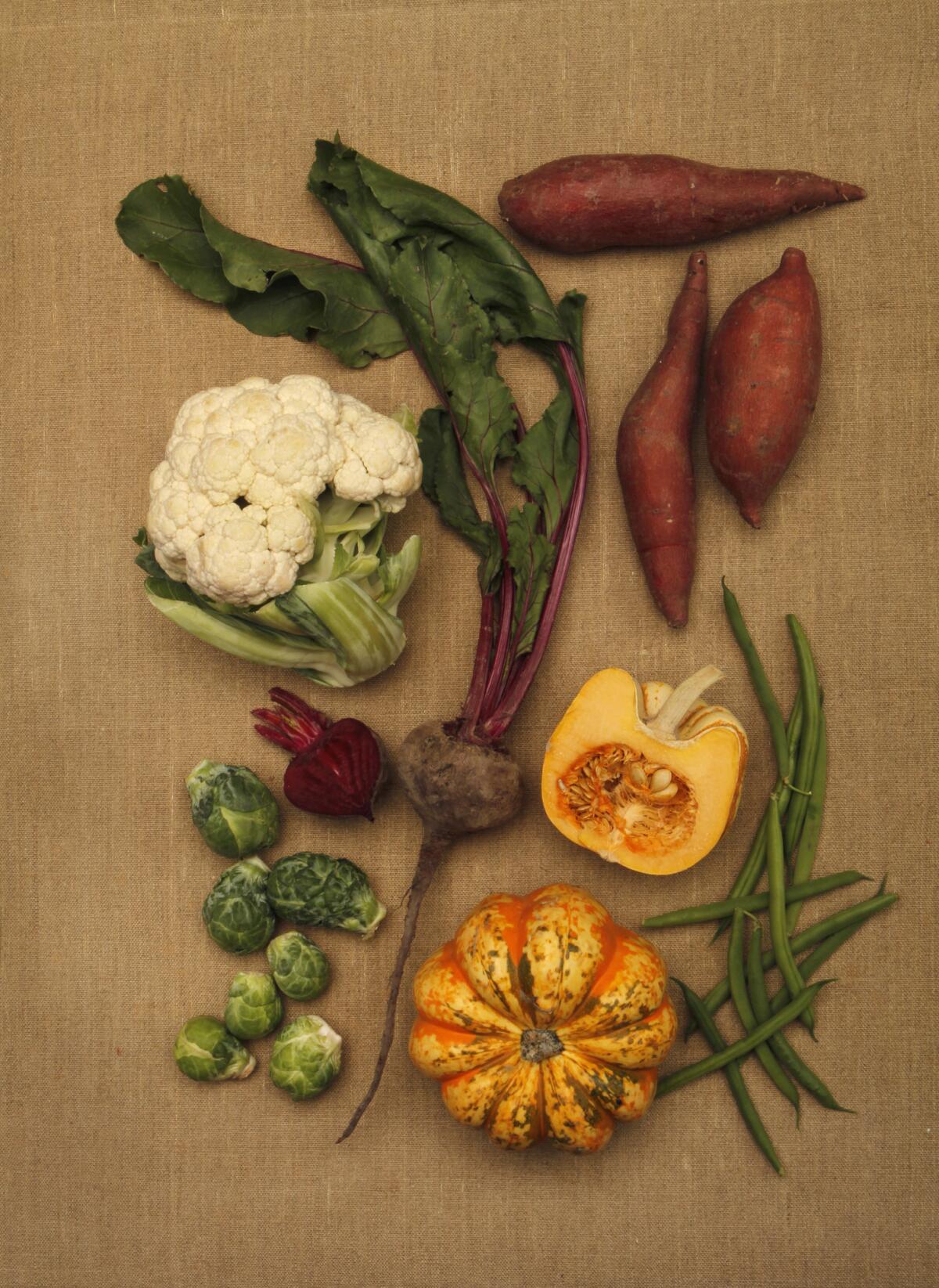 A selection of vegetables including cauliflower, beets, brussels sprouts, yam, sweet potato, winter squash, and green beans were photographed at the Los Angeles Times studio on November 5, 2014.