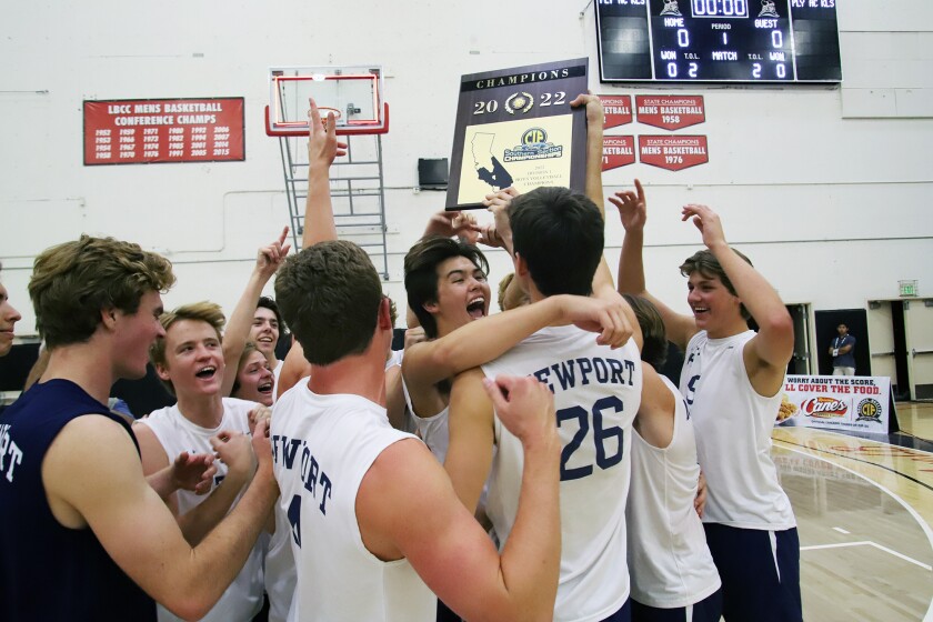 The Newport Harbor High boys' volleyball team celebrates after winning the CIF Southern Section Division 1 final.