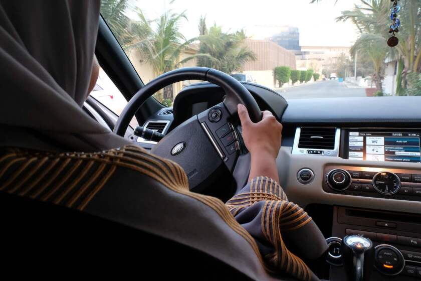A Saudi woman drives her car along a street in the Saudi coastal city of Jeddah, on September 27, 2017. Saudi Arabia will allow women to drive from next June, state media said on September 26, 2017 in a historic decision that makes the Gulf kingdom the last country in the world to permit women behind the wheel. / AFP PHOTO / REEM BAESHENREEM BAESHEN/AFP/Getty Images ** OUTS - ELSENT, FPG, CM - OUTS * NM, PH, VA if sourced by CT, LA or MoD **