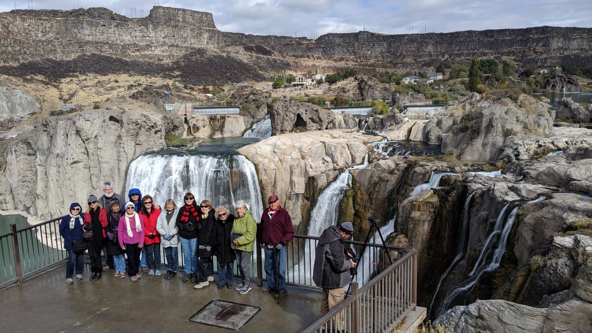 Walkabout participants pause in front of Shoshone Falls in Idaho in 2019.