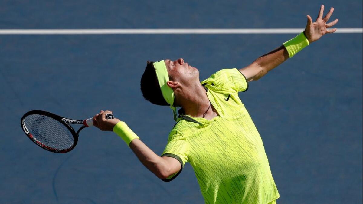 Jared Donaldson serves to David Goffin of Belgium during the first round of the U.S. Open on Aug. 30.