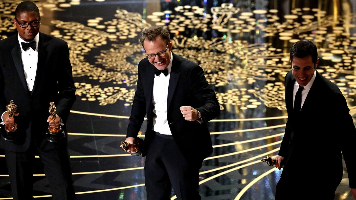 Director Tom McCarthy with the Oscar for best picture, "Spotlight."