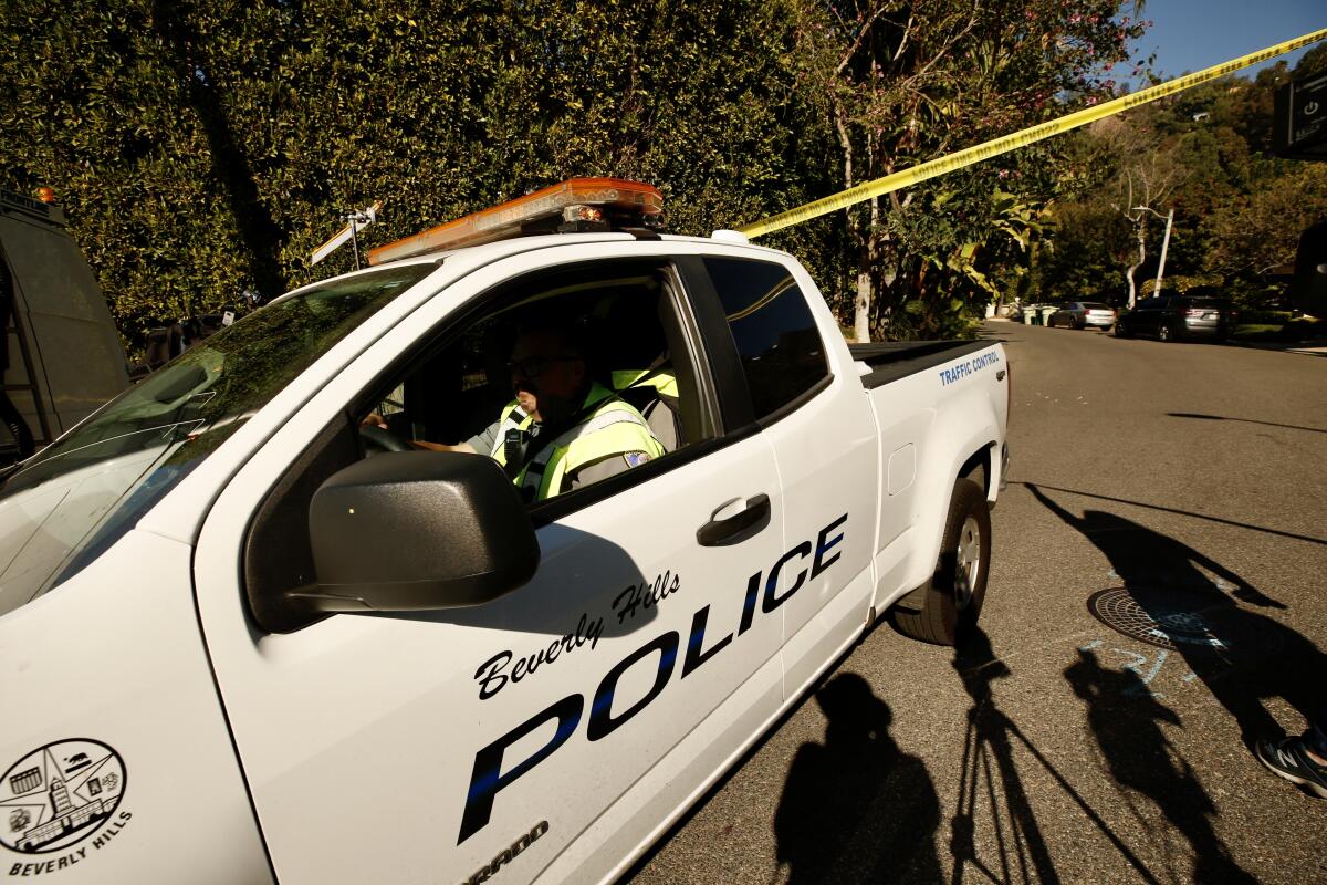 Police tape cordons off the area near the Avants' Beverly Hills home 