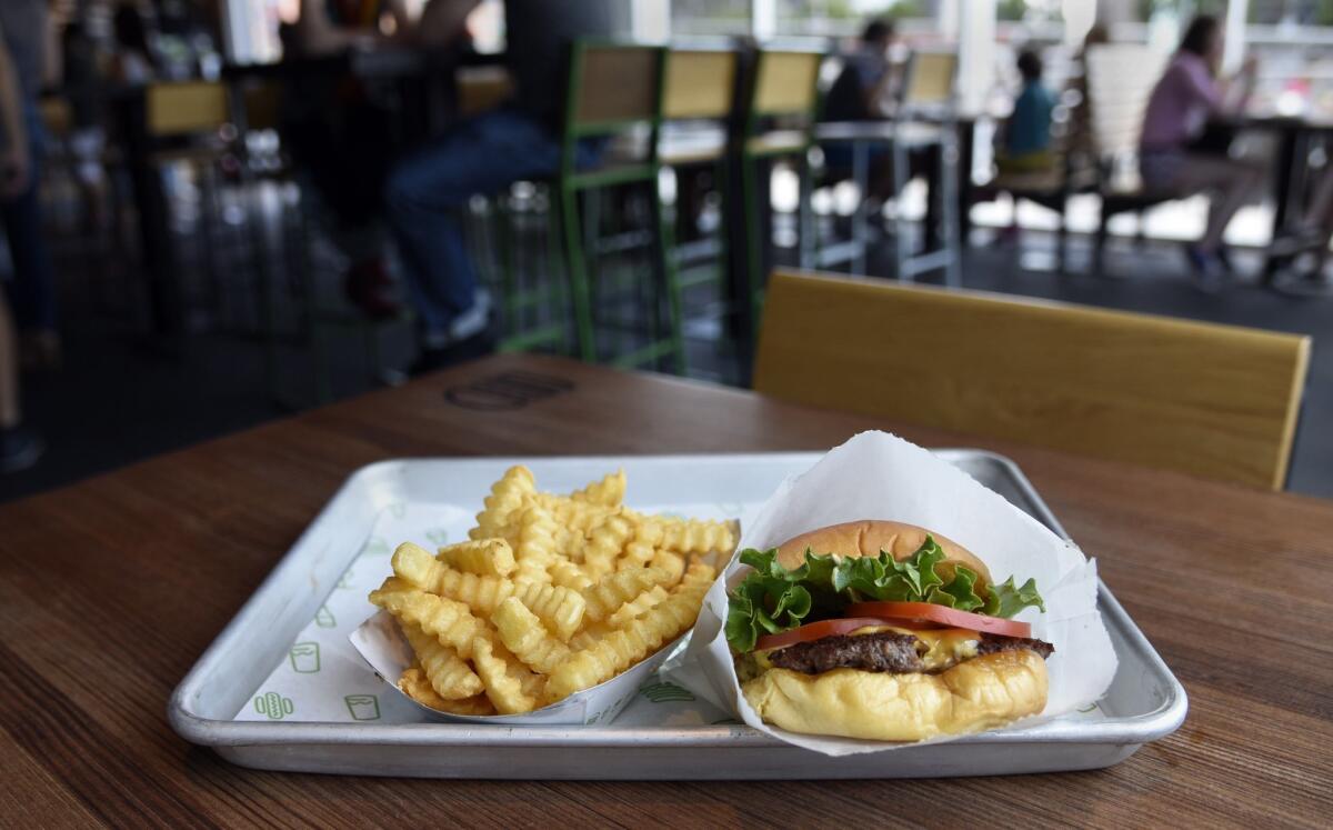 The Shackburger with fries at Shake Shack. The popular New York-based fast-casual chain will open its second location in the Los Angeles are in downtown Glendale.