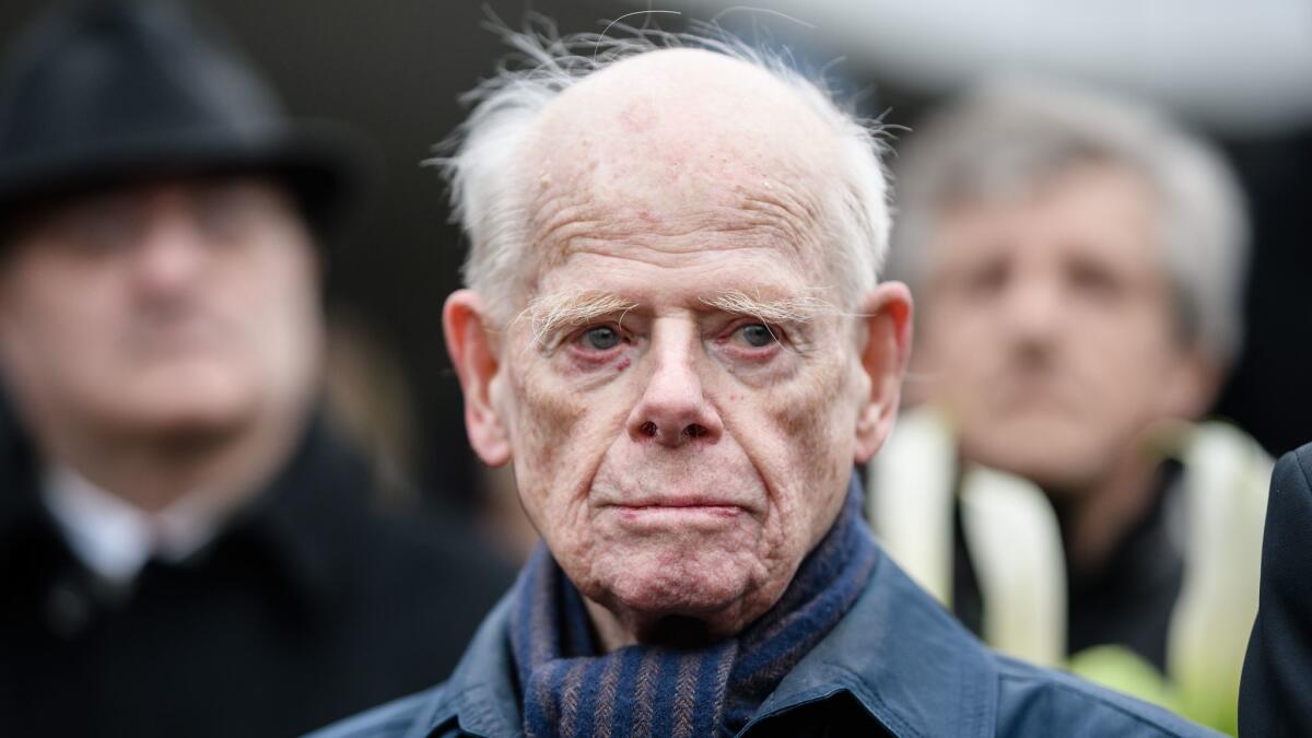 A 93-year-old Norwegian concentration camp survivor, Bernd Lund, attends a remembrance ceremony at the former concentration camp Sachsenhausen in Oranienburg near Berlin.