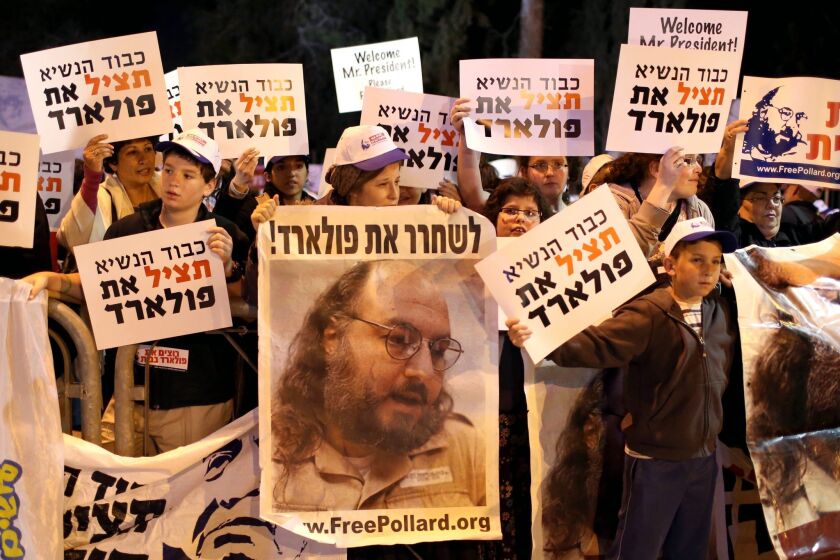 Some 1,000 demonstrators in Jerusalem call for the release of the Jonathan Pollard, a former U.S. naval intelligence analyst who is serving a life sentence for spying for Israel.