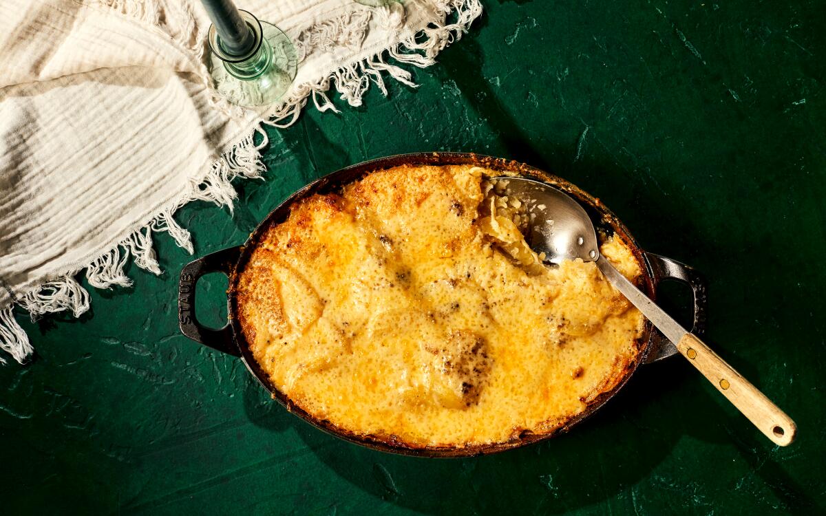Cream and potatoes marry into a bubbling, rich gratin in this classic French dish, topped with Gruyère cheese.