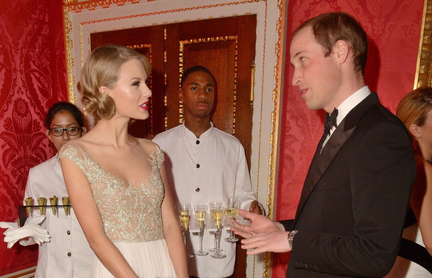 Taylor Swift performs for, and with, Prince William in London palace