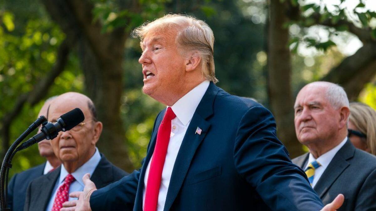 President Trump speaks about the FBI's investigation into Supreme Court nominee Brett Kavanaugh in the White House Rose Garden on Monday.