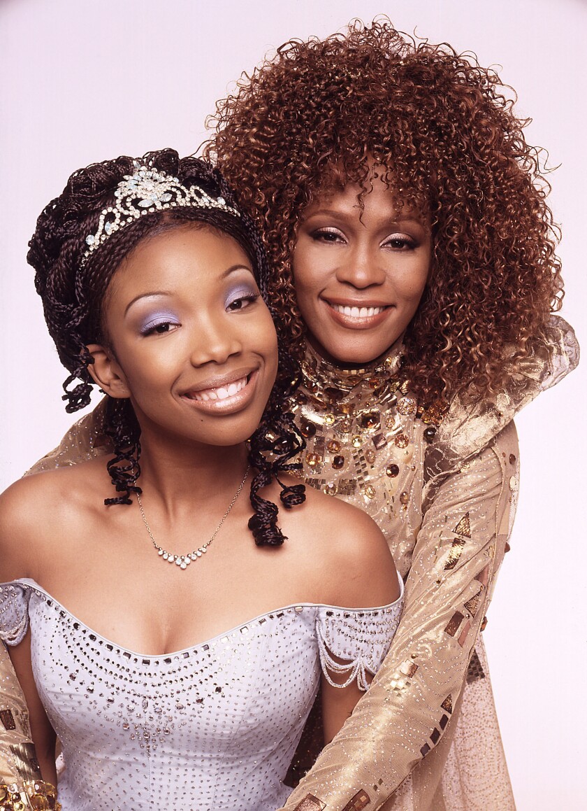 Brandy Norwood and Whitney Houston in a promo shot for 1997's TV movie "Cinderella."