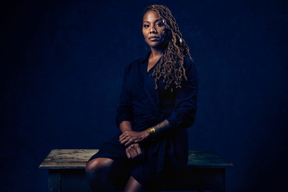 A woman is sitting on a table