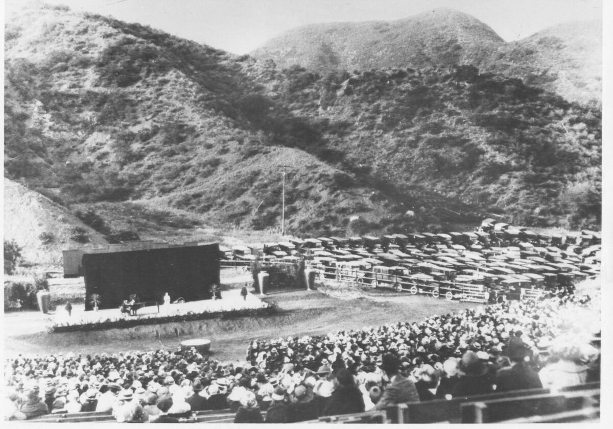 The Hollywood Bowl in 1922, when the venue was a simple stage surrounded by undeveloped hills.