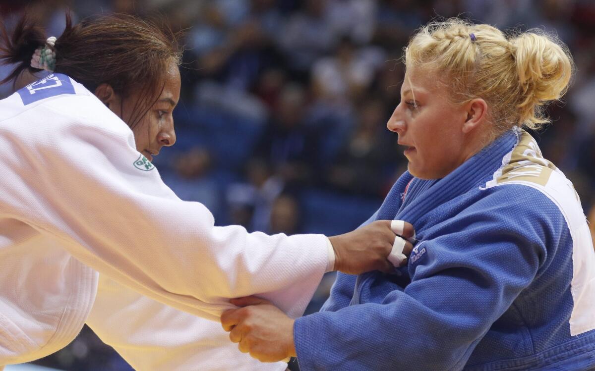 Yahima Ramirez, left, spars against Kayla Harrison during the Judo World Championships.