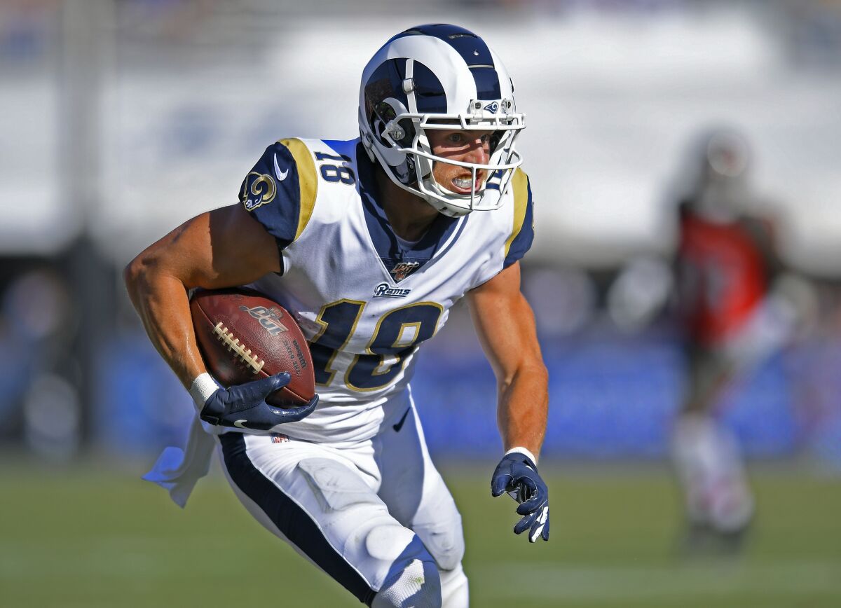 Rams wide receiver Cooper Kupp runs with the ball against the Tampa Bay Buccaneers on Sunday.