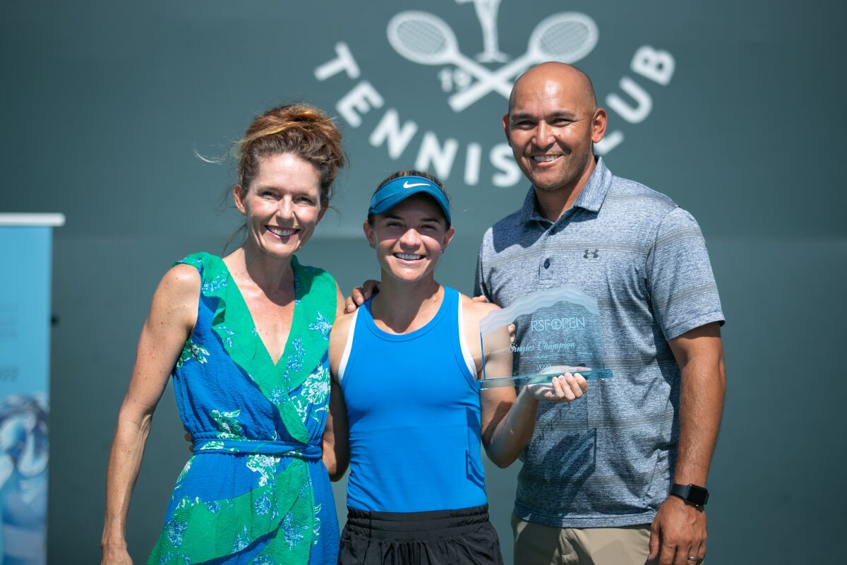 Stacey Pennington and RSF Tennis Club Manager John Chanfreau with RSF Open winner Marcela Zacarias.