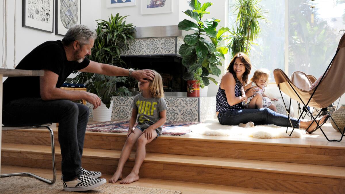 The Smith family at home in Venice. From left: Brian Smith, co-founder of Winc wine club, son Nico, Gina Nigrelli-Smith and daughter Ruby.