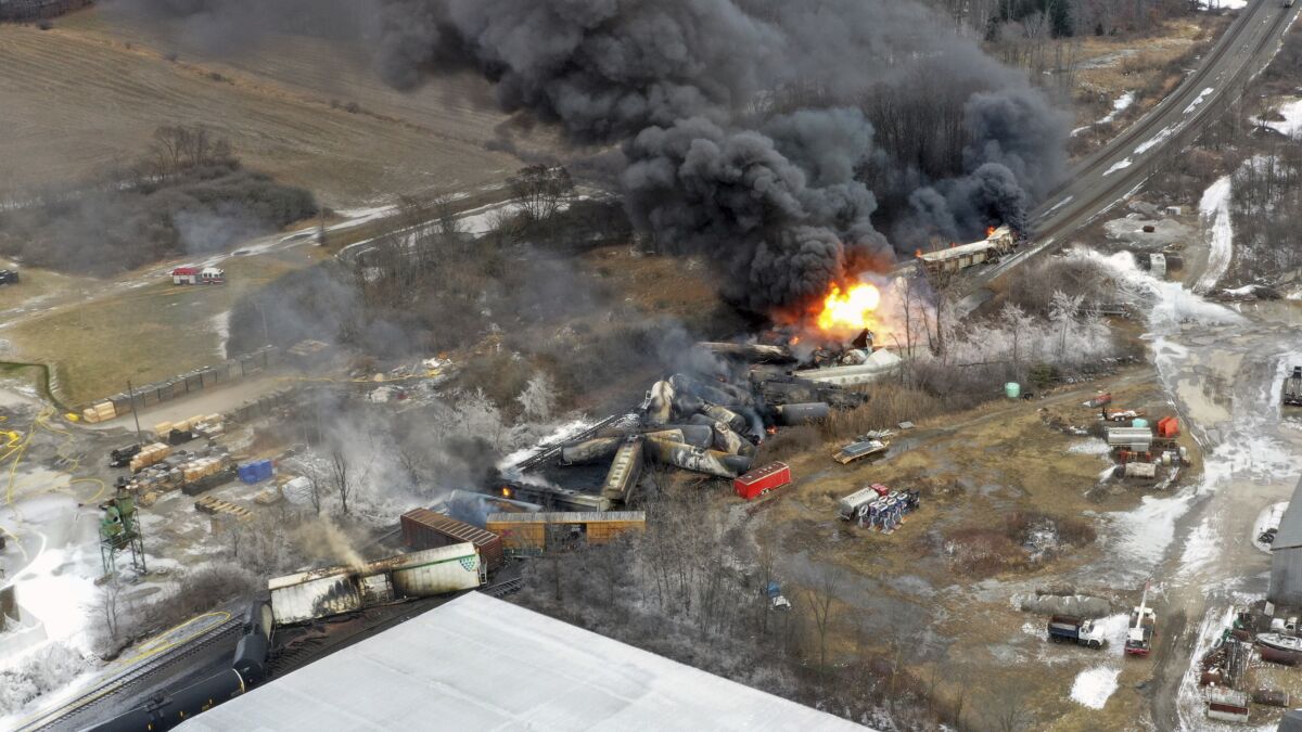 Portions of a Norfolk Southern freight train that derailed in East Palestine, Ohio, were still on fire on Feb. 4