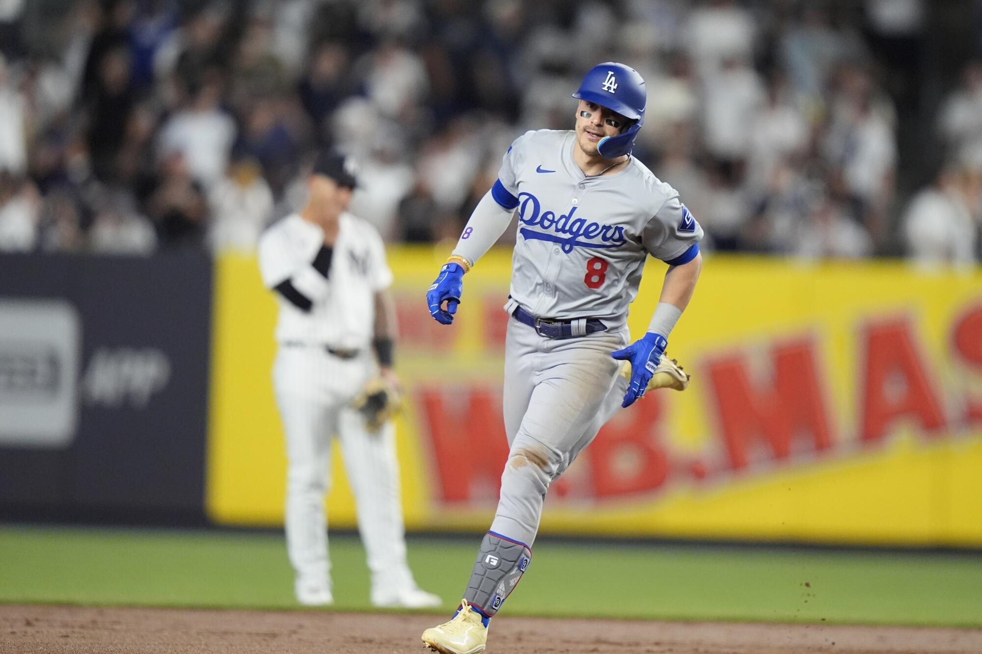 The Dodgers' Kiké Hernández rounds the bases after hitting a home run during Saturday's game against the Yankees.