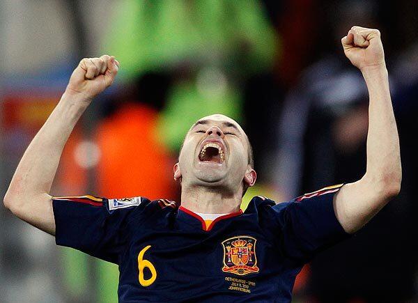Spain's Andres Iniesta celebrates after scoring a goal during the World Cup championship game against Netherlands.